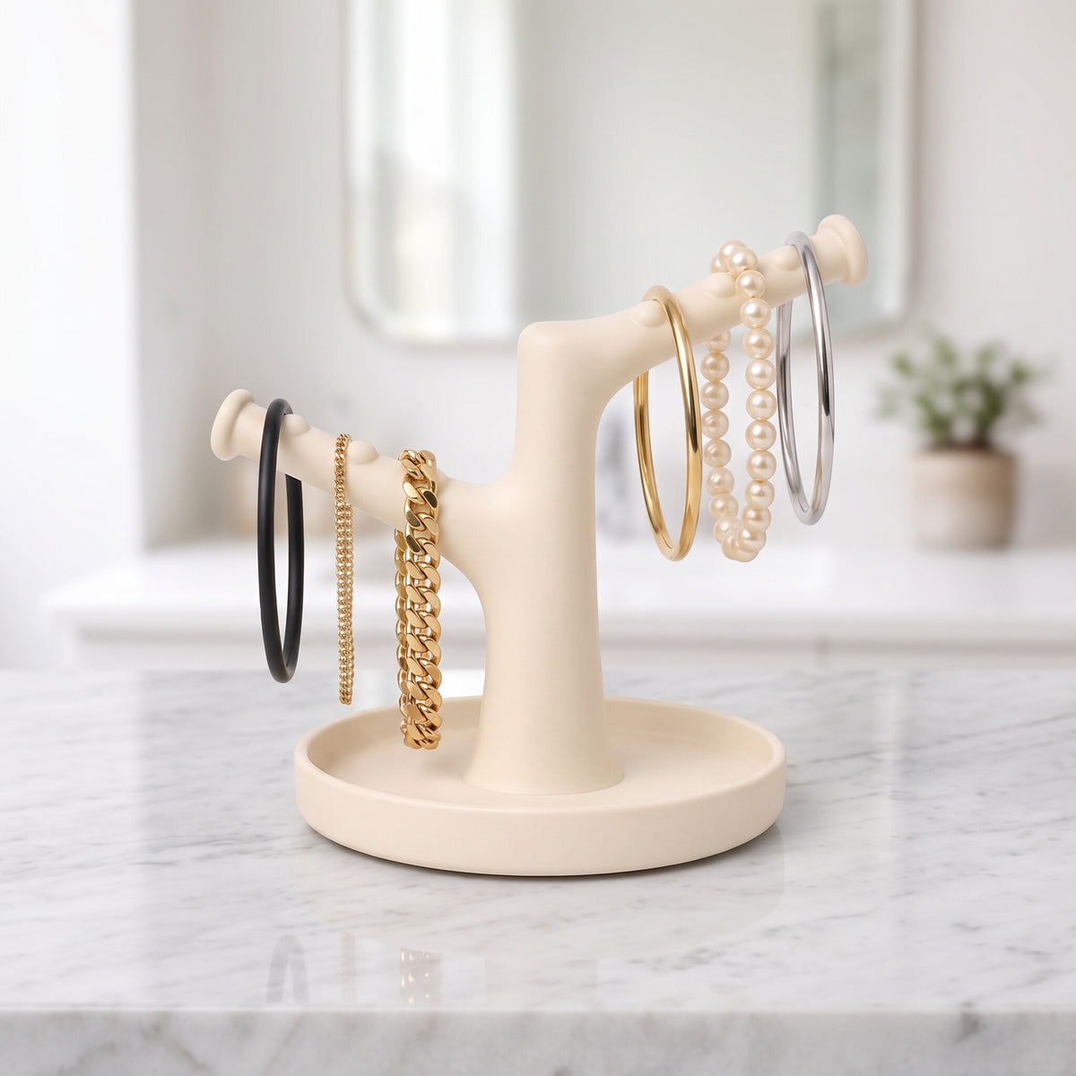 Bracelet Tree Holder with bracelets on a marble bathroom vanity