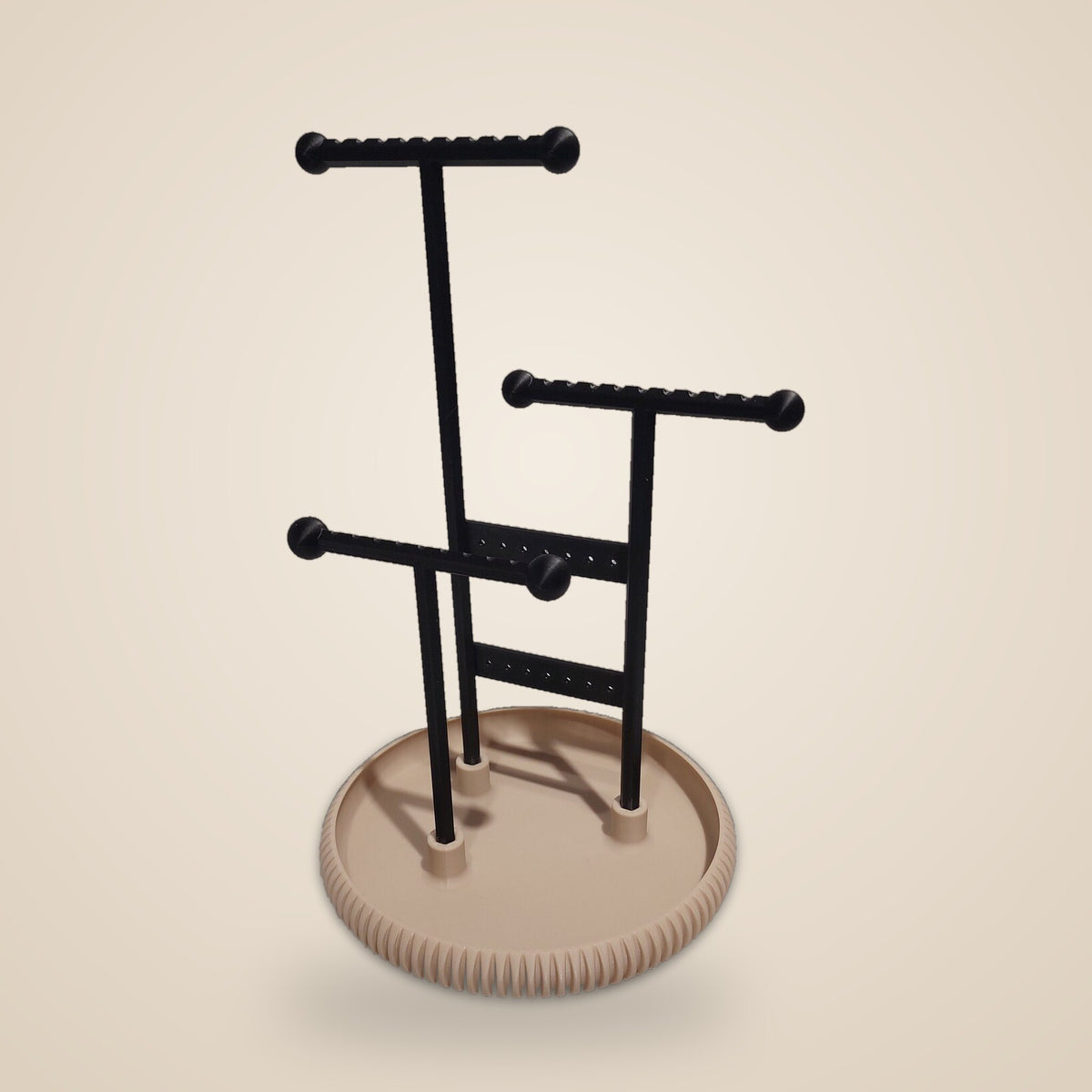 Jewelry Stand Regular size – black arms on a beige ribbed tray, studio view