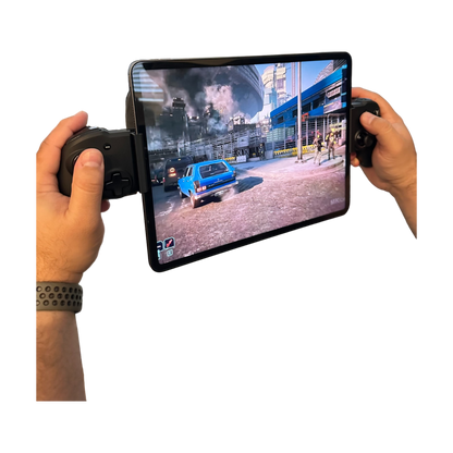 RIG Nacon MG-X PRO expansion kit in use, hands holding a tablet with the RIG Nacon MG-X PRO