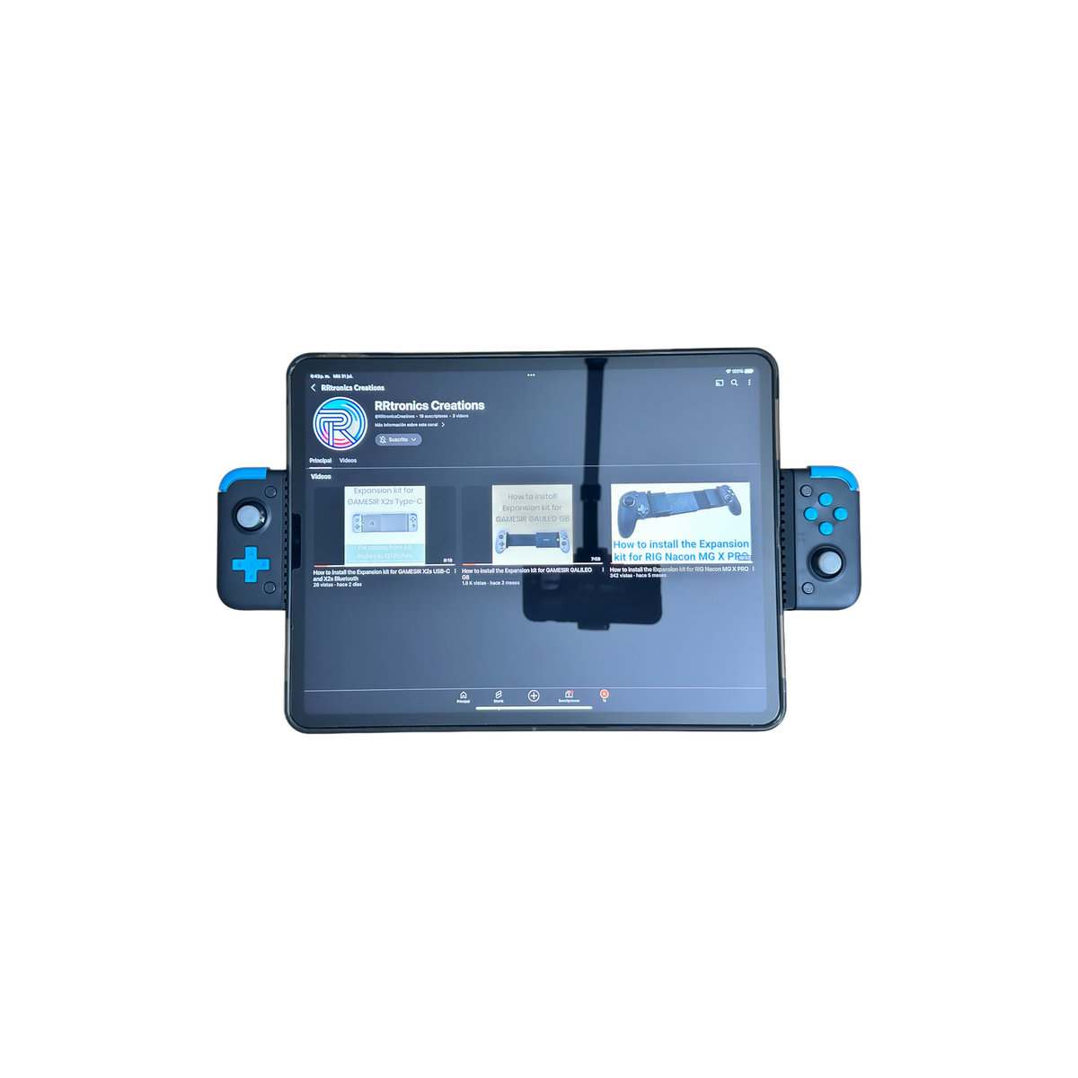 Gamesir X2S Bluetooth expansion kit holding a tablet in use