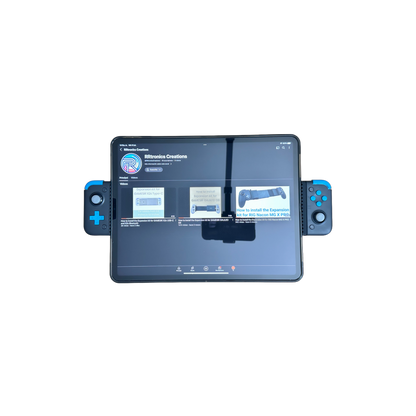 Gamesir X2S Bluetooth expansion kit holding a tablet in use