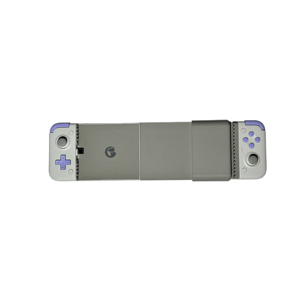 Gamesir X2S Type-C expansion kit holding a phone, retainer fitted